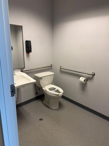 Accessible office restroom cleaned and sanitized