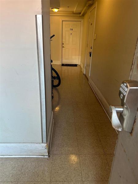 Apartment building hallway cleaned