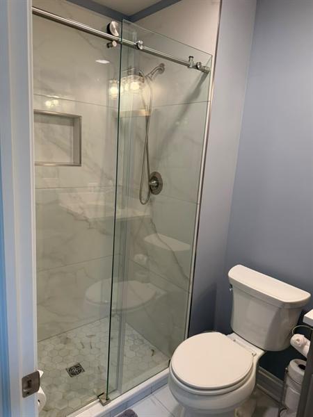 Glass-door shower cleaned after remodel
